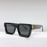 Close-up detail view of Louis Vuitton unisex sunglasses
