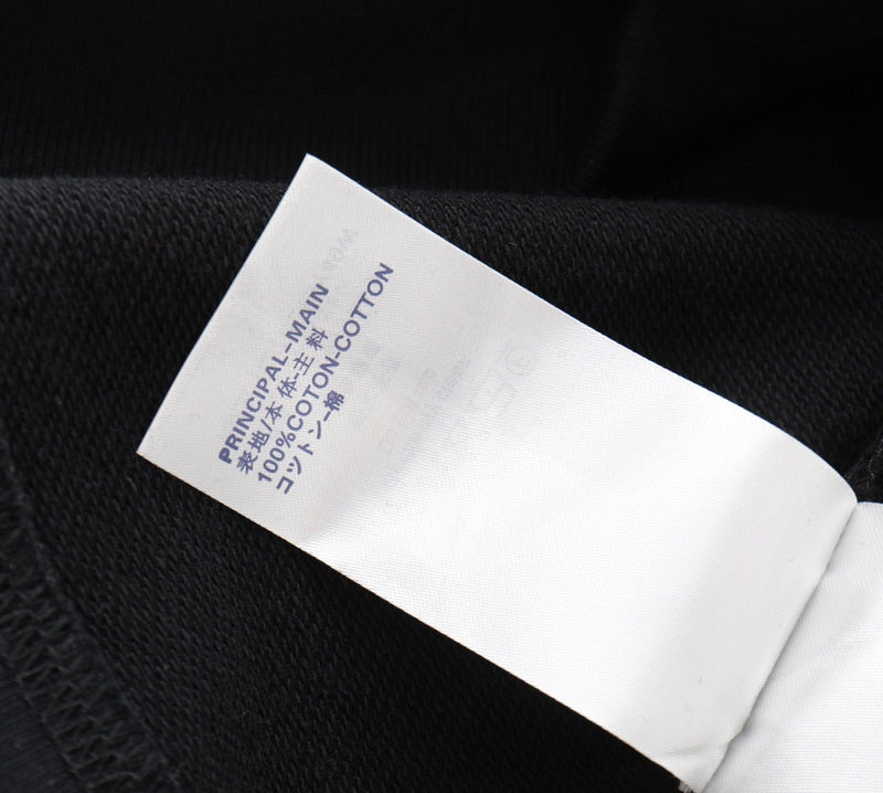 Close-up detail shot of Louis Vuitton luxury clothing with tailored silhouette