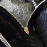 Top view of polished refined women's handbag – women's designer-style accessory