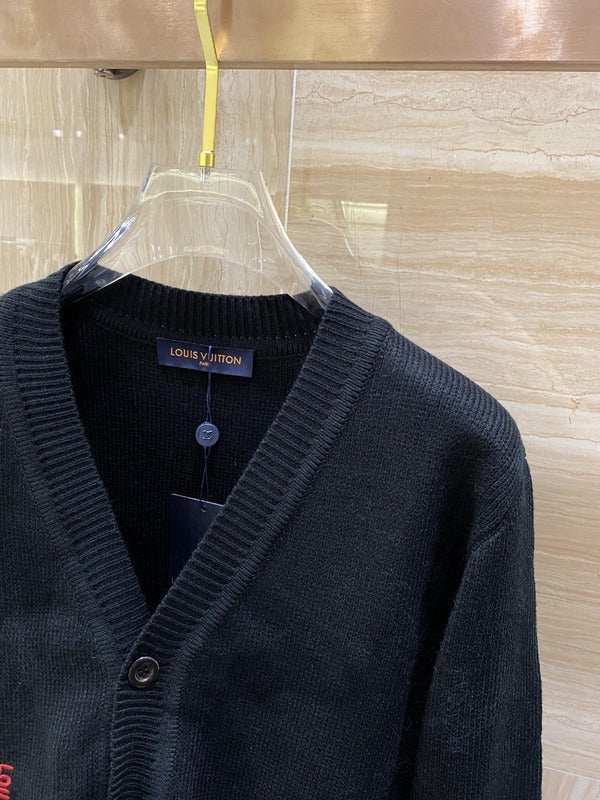 Close-up detail shot of Louis Vuitton luxury clothing with monogram-inspired silhouette