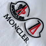 Close-up detail shot of Moncler luxury clothing with tailored silhouette