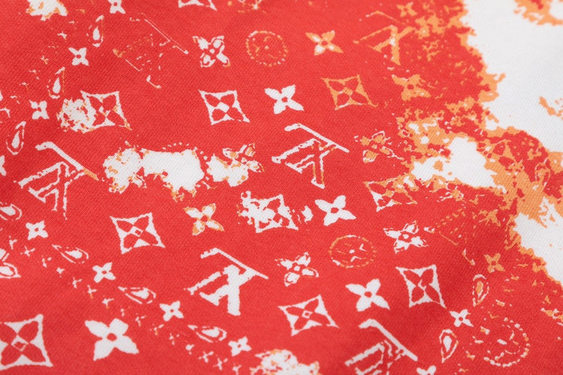 Close-up detail shot of Louis Vuitton luxury clothing with signature branding