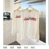 Front view of Louis Vuitton luxury clothing with monogram-inspired silhouette