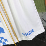 Flat lay presentation of Rhude luxury clothing with logo-detail design
