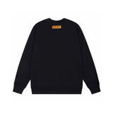 Back view of Louis Vuitton luxury clothing with signature branding