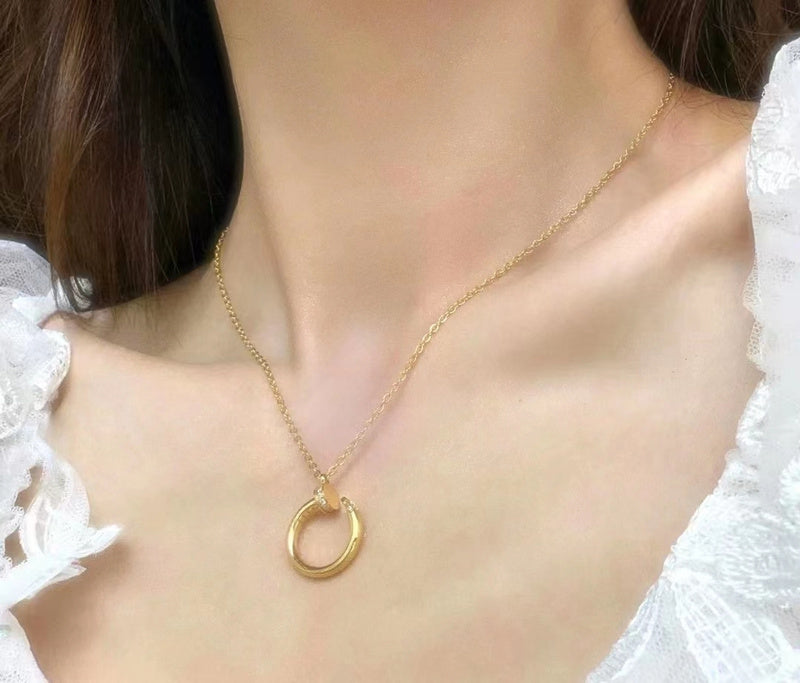 Side view of Cartier unisex jewelry piece