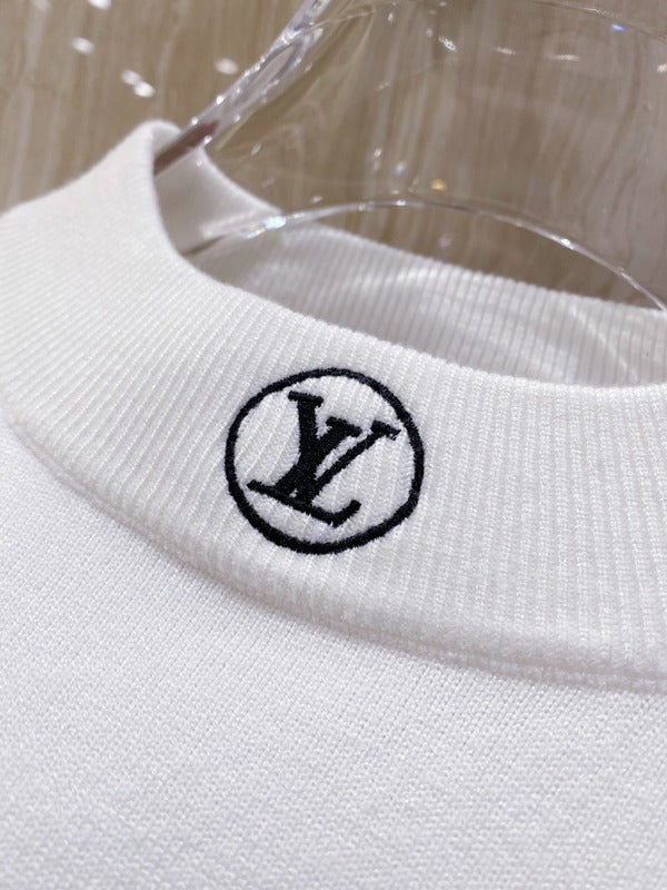 Flat lay presentation of Louis Vuitton luxury clothing with streetwear-inspired cut