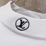 Flat lay presentation of Louis Vuitton luxury clothing with streetwear-inspired cut