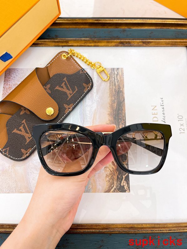 Close-up detail view of Louis Vuitton unisex sunglasses