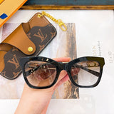 Close-up detail view of Louis Vuitton unisex sunglasses