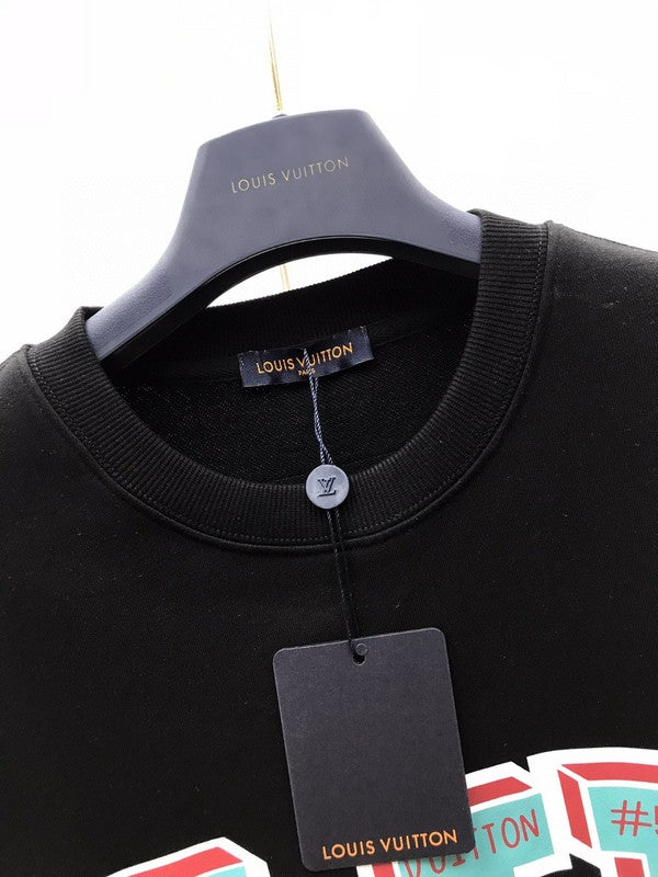 Flat lay presentation of Louis Vuitton luxury clothing with runway-inspired design
