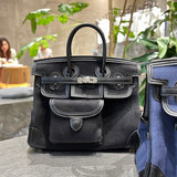  Contemporary carryall bag carried on shoulder