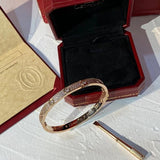 Front view of Cartier unisex jewelry piece