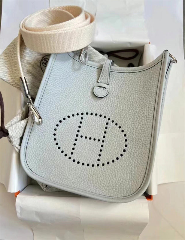  structured top-handle bag styled with outfit 30