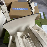 Front view of modern chic women's handbag – women's statement bag