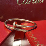 Front view of Cartier unisex jewelry piece