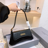 Ziva's Charm handbag – styled view (one versatile size)