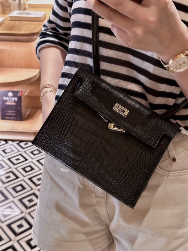 Side view of sleek structured handbag