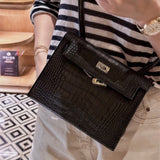 Side view of sleek structured handbag