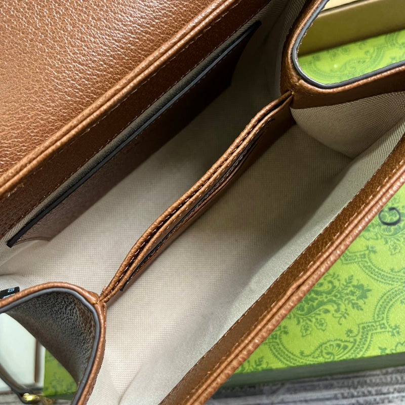 Side profile of sleek premium women's handbag – women's luxury accessory