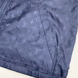 Back view of Louis Vuitton luxury clothing with tailored silhouette