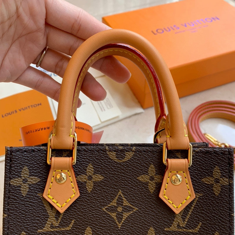 Handle and strap detail of sleek polished women's handbag – women's premium purse
