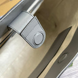 Close-up detail of everyday-luxe sleek women's handbag – women's luxury accessory