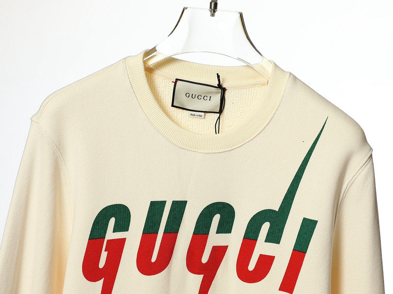 Close-up detail shot of Gucci luxury clothing with tailored silhouette