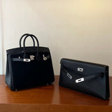  Essential structured bag carried on shoulder