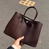  Minimalist shoulder bag carried on shoulder 10