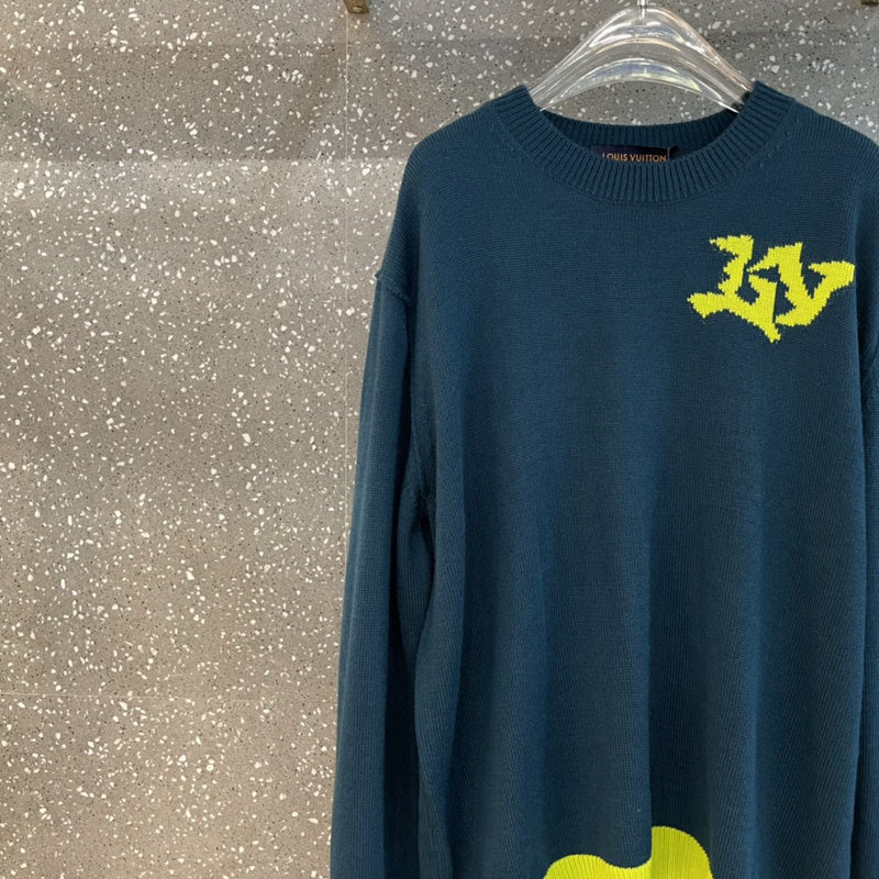 Back view of Louis Vuitton luxury clothing with label-forward styling