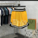 Front view of Rhude luxury clothing with streetwear-inspired cut