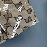Front view of Gucci luxury clothing with monogram-inspired silhouette