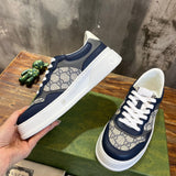 Side profile of Gucci fresh white-and-black sneakers sleek tonal finish