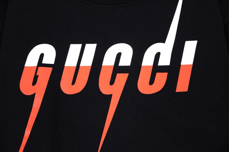 Flat lay presentation of Gucci luxury clothing with tailored silhouette