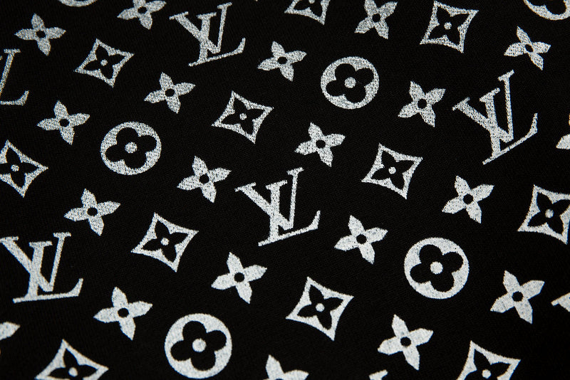 Full styled look of Louis Vuitton luxury clothing with signature branding