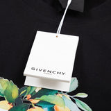 Close-up detail shot of Givenchy luxury clothing with monogram-inspired silhouette