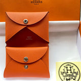 Side view of understated structured handbag