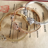 Close-up detail view of Cartier unisex jewelry piece