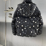 Side profile of Louis Vuitton luxury clothing with logo-detail design