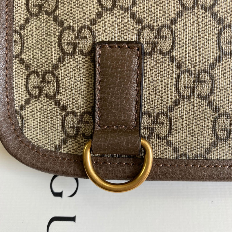 Handle and strap detail of modern everyday-luxe women's handbag – women's designer-style accessory