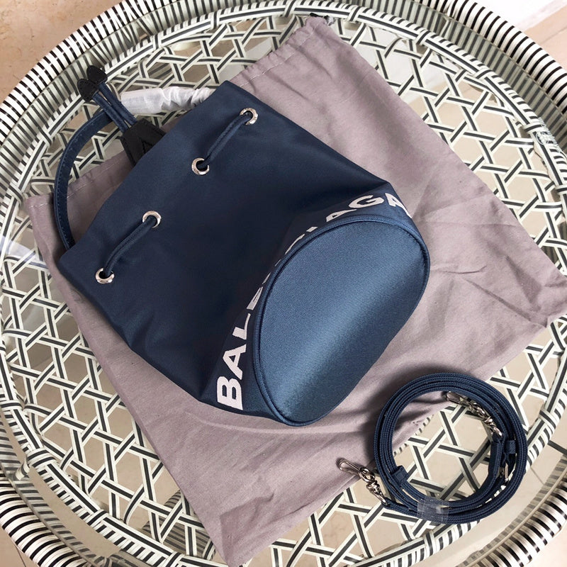 Styled lifestyle shot of statement sleek women's handbag – women's statement bag