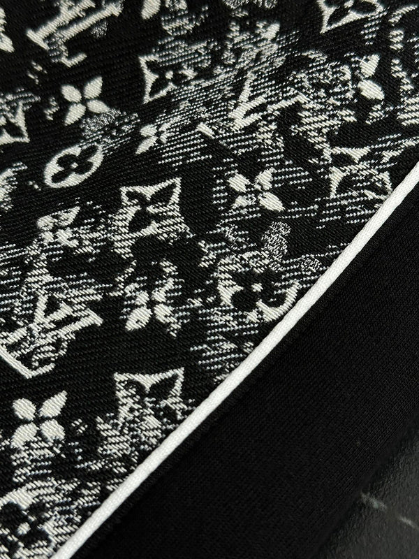 Front view of Louis Vuitton luxury clothing with label-forward styling