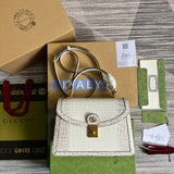 Side profile of structured classic women's handbag – women's premium purse