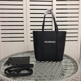 Side profile of sleek premium women's handbag – women's statement bag