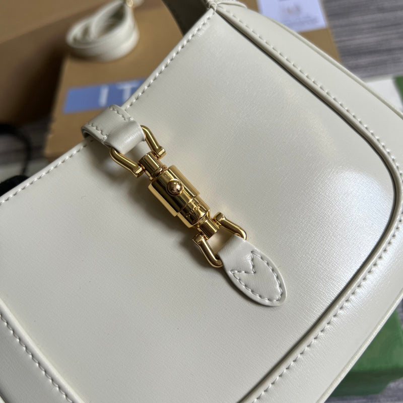 Handle and strap detail of statement classic women's handbag – women's everyday handbag