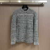 Front view of Louis Vuitton luxury clothing with logo-detail design