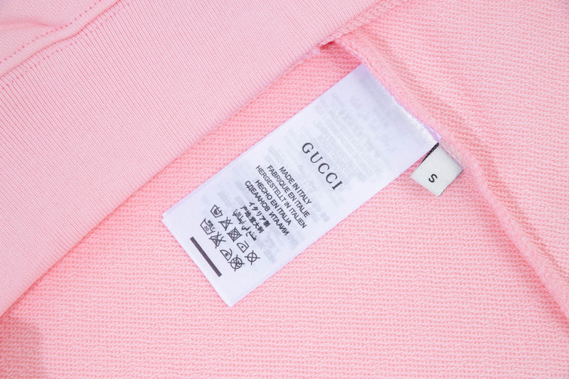Close-up detail shot of Gucci luxury clothing with contemporary cut