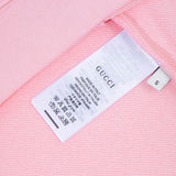 Close-up detail shot of Gucci luxury clothing with contemporary cut