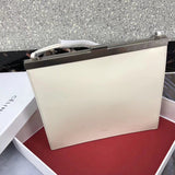 Back view of statement polished women's handbag – women's statement bag